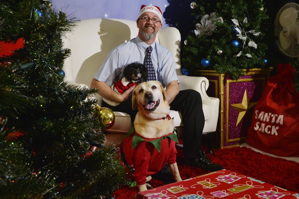 Paul Shooter with Audrey and Carla. Harvey Norman have set up an area where pets can come and meet Santa. Paul Shooter with Audrey and Carla. Harvey Norman have set up an area where pets can come and meet Santa.